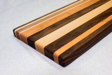 Load image into Gallery viewer, Walnut with stripes of Maple, Cherry and Purple Heart Cutting Board