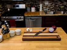 Load image into Gallery viewer, Walnut with stripes of Maple, Cherry and Purple Heart Cutting Board
