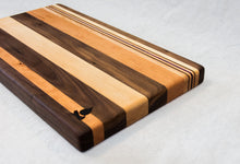 Load image into Gallery viewer, Walnut with stripes of Maple, Cherry and Purple Heart Cutting Board
