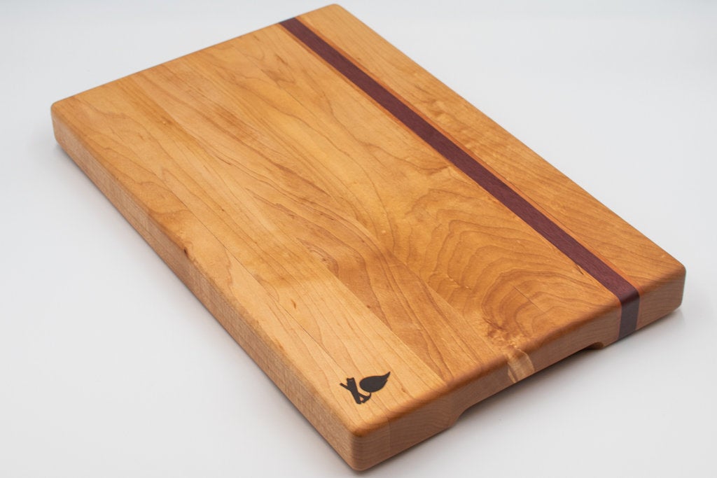 Maple with stripes of Cherry and Purple Heart Cutting Board